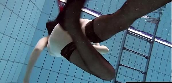  Underwater swimming babe Vera Brass